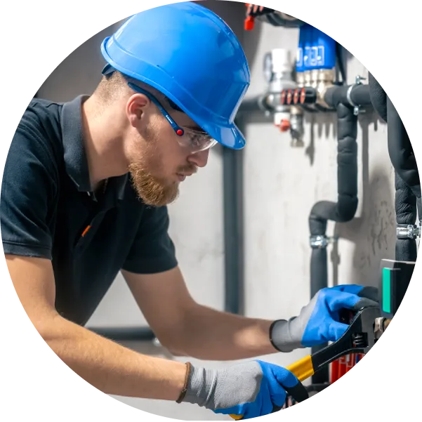 A man works with heating