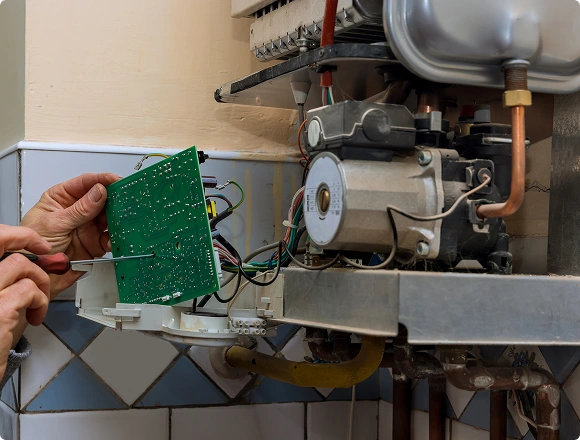 The man is replacing the heater.