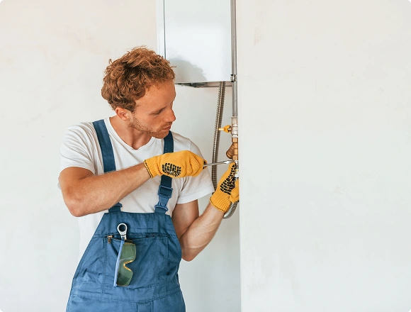 The man is replacing the heater.